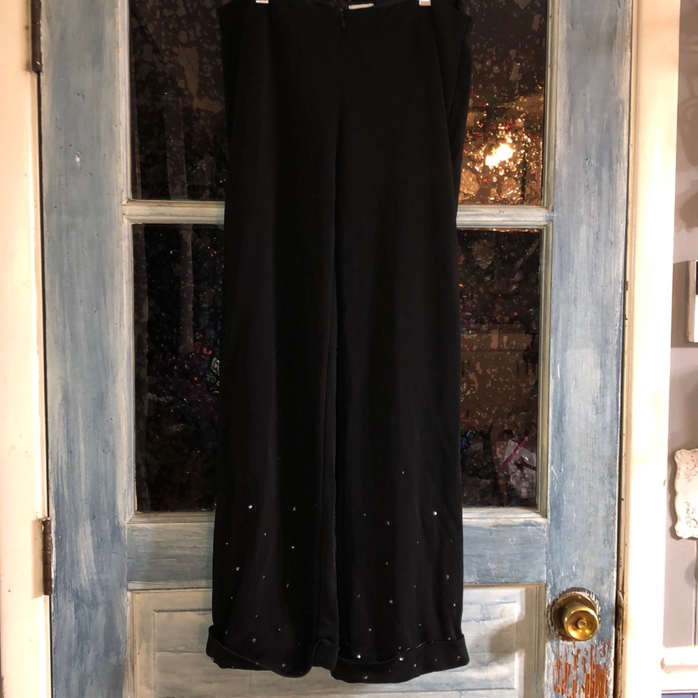 Black slacks with crystals at the bottom